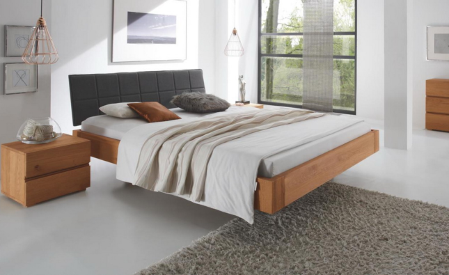 Somn odihnitor pe un pat din lemn masiv: Ghidul complet