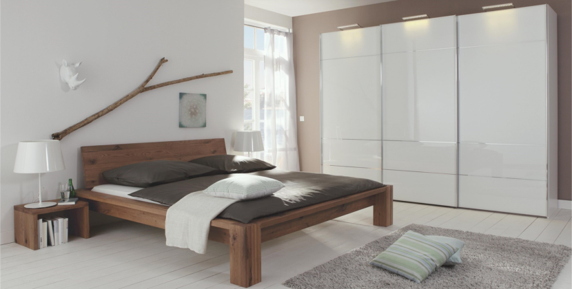 Patul din lemn masiv: Eleganță și durabilitate în dormitor”